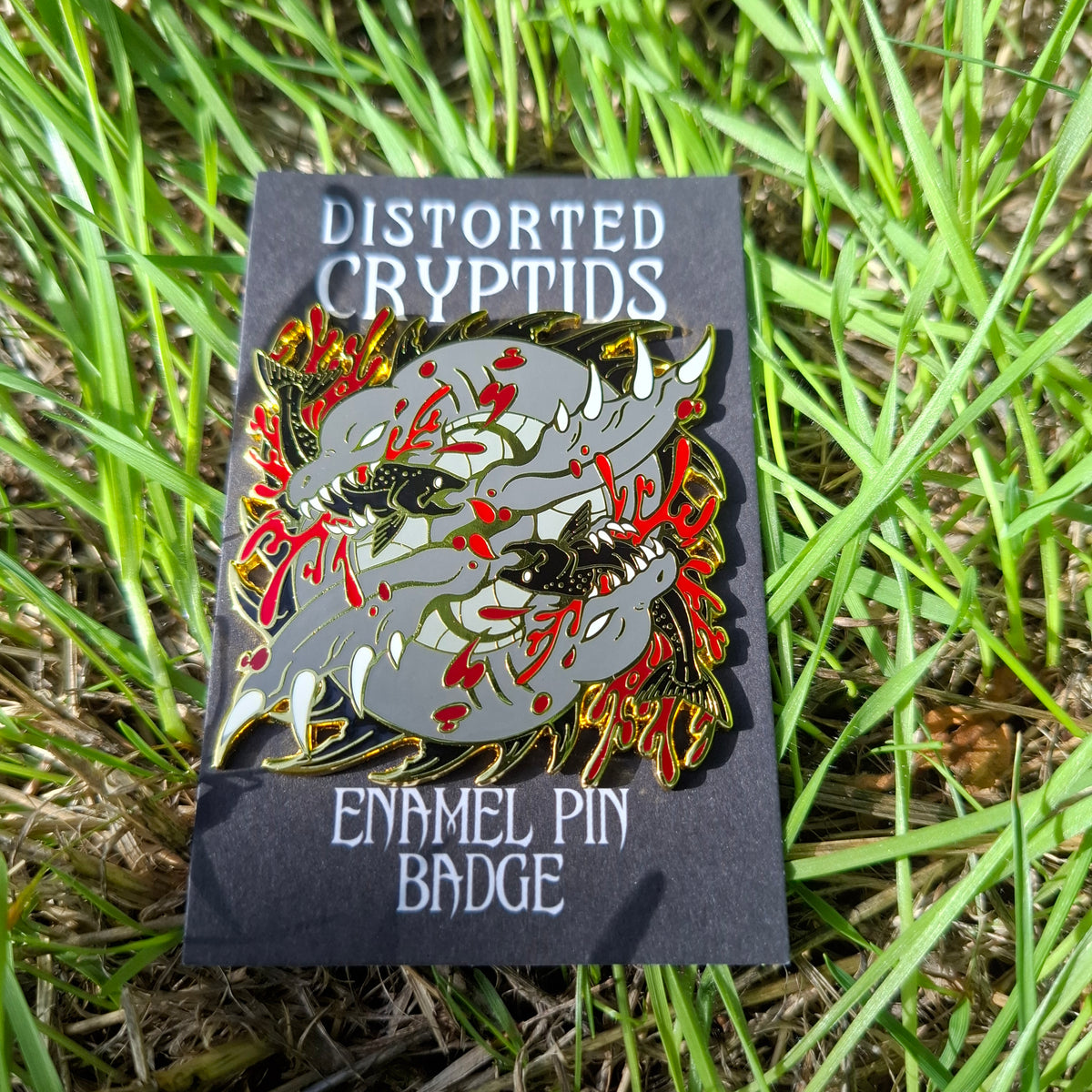 Nessie Gold Distorted Cryptid Enamel Pin